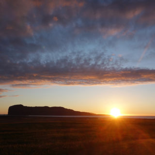 The midnight sun over the headland